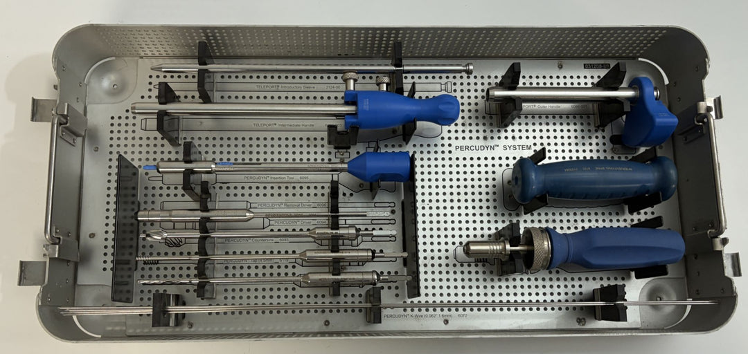 Sterilization tray containing stainless steel surgical instruments with blue handles from Interventional Spine, designed for spine procedures and medical use.