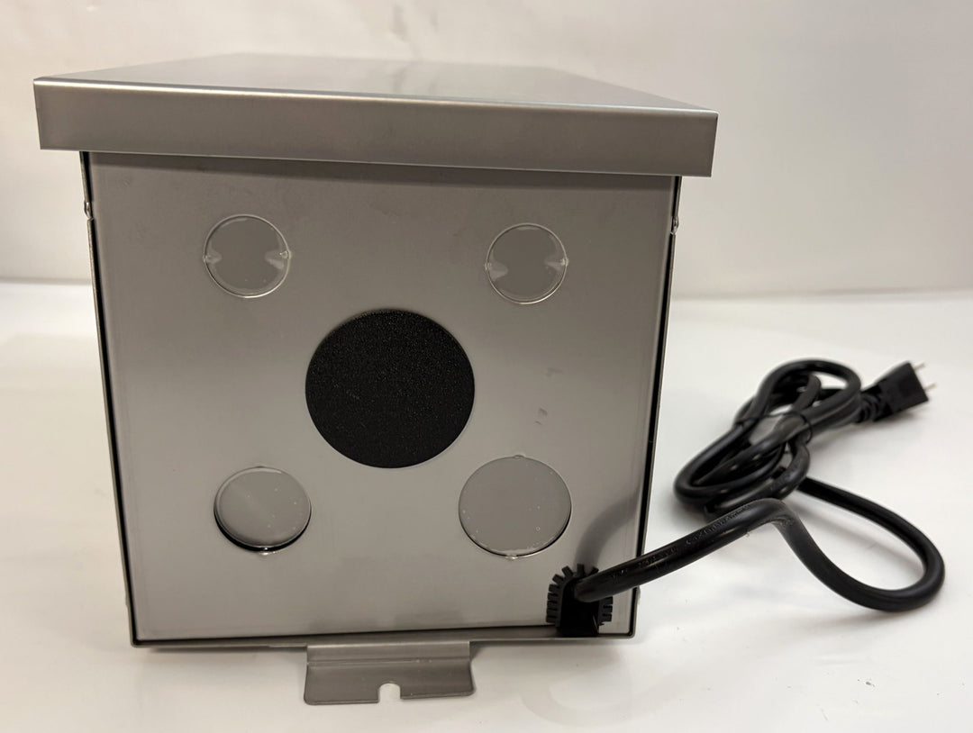 Stainless steel Dauer landscape transformer with mounting bracket and attached power cord, designed for outdoor electrical applications in commercial and residential settings.