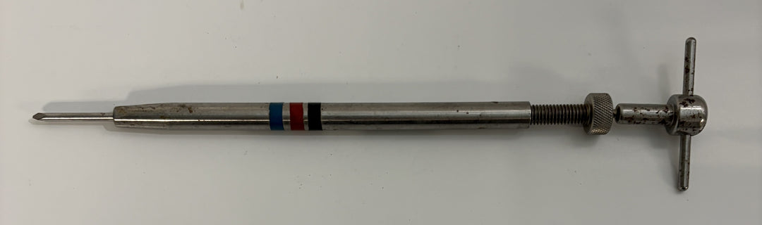 Depuy AcroMed spinal pedicle screw depth gauge instrument with calibrated metal body, featuring a rotating handle and measurement markings for precise surgical use.