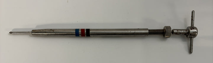 Depuy AcroMed spinal pedicle screw depth gauge instrument with calibrated metal body, featuring a rotating handle and measurement markings for precise surgical use.