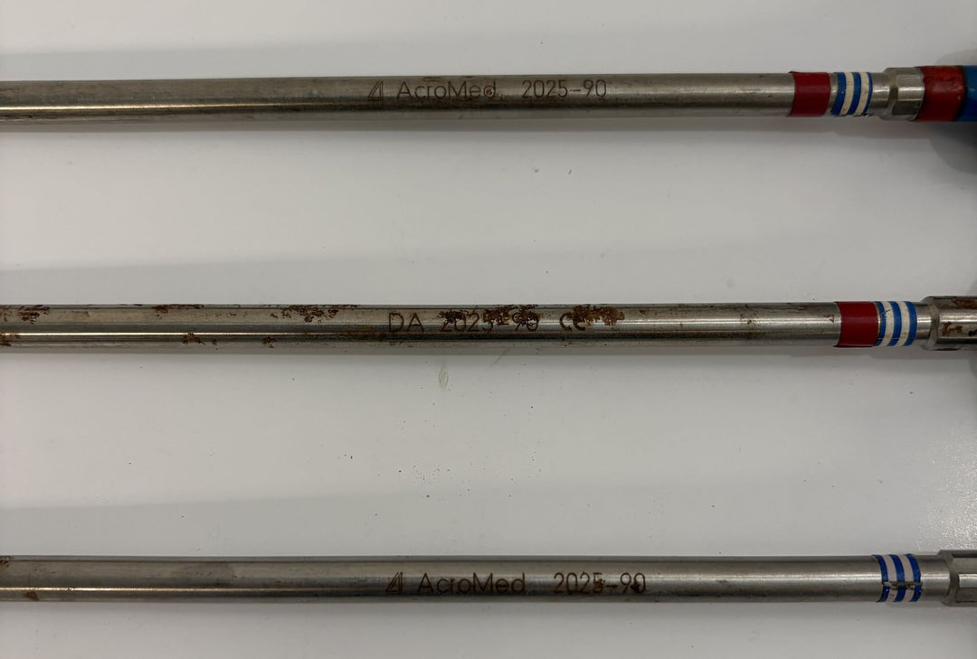 Three stainless steel spinal pedicle probe instruments with colored ring markings on the handles, designed for precise medical use by Depuy AcroMed.