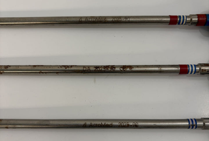 Three stainless steel spinal pedicle probe instruments with colored ring markings on the handles, designed for precise medical use by Depuy AcroMed.