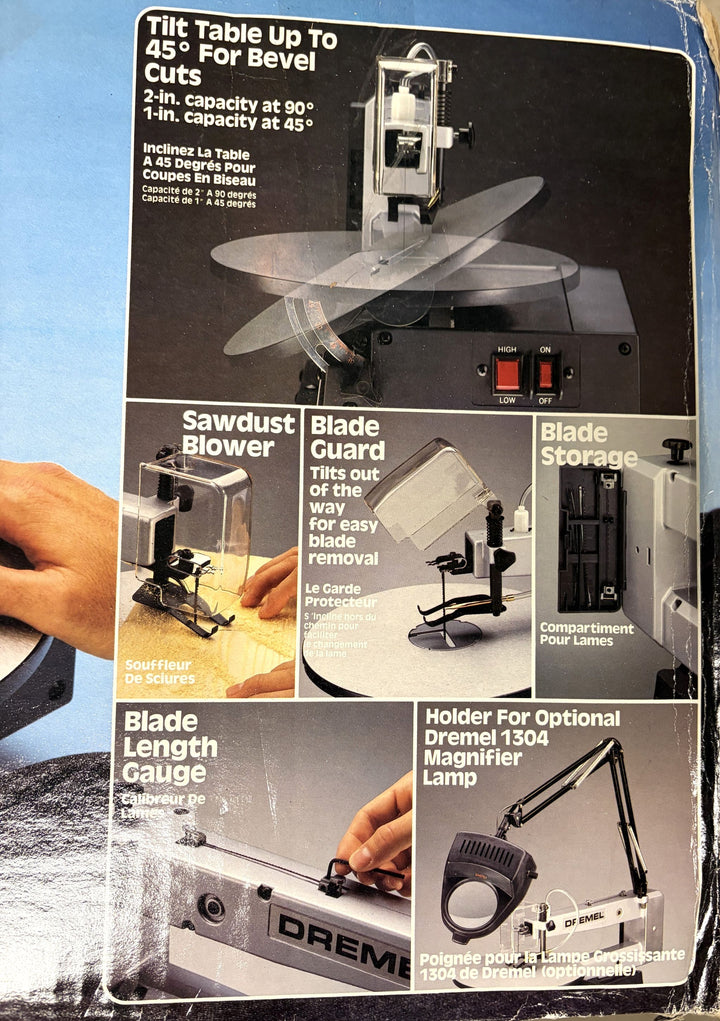 Dremel two-speed scroll saw demonstrating adjustable tilt table for bevel cuts, sawdust blower, blade guard, blade storage compartment, blade length gauge, and optional magnifier lamp holder.