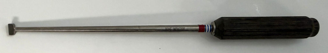AcroMed bone graft impactor surgical tool with a long slender metal shaft and a textured black handle designed for precision in spinal procedures.
