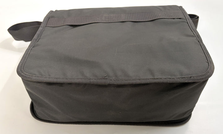 Charcoal gray fabric travel bag designed for Resmed AirSense 10 CPAP device, featuring a sturdy handle and compact rectangular shape.