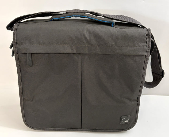 Charcoal gray travel bag designed for Resmed AirSense 10 CPAP device, featuring durable fabric with front zipper pocket and adjustable shoulder strap.