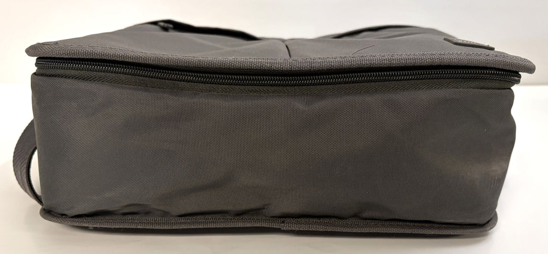 Charcoal gray Resmed travel bag designed to hold the AirSense 10 CPAP device, featuring a zippered closure and durable fabric construction.