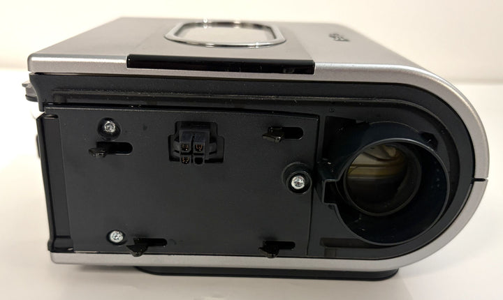 Close-up view of a pre-owned Resmed humidifier component featuring a black plastic base with mounting points and a clear view of the water chamber inlet.