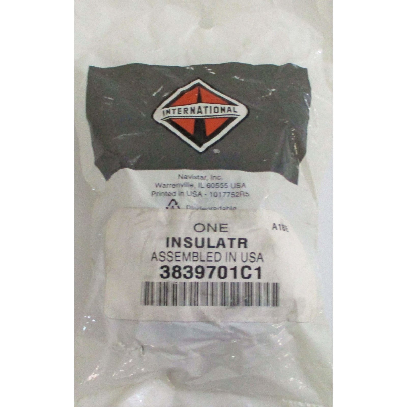 Plastic-wrapped Navistar International automotive hood insulator part labeled 3839701C1, assembled in the USA with clear product barcode and branding.