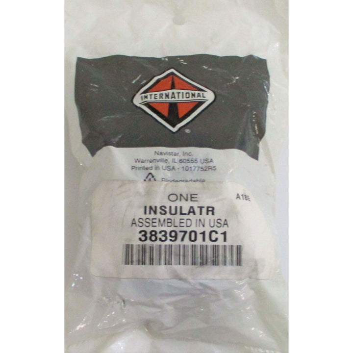Plastic-wrapped Navistar International automotive hood insulator part labeled 3839701C1, assembled in the USA with clear product barcode and branding.