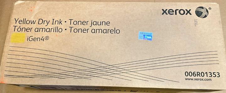 Cardboard packaging box for a Xerox yellow dry ink toner cartridge iGen4 model 006R01353 with PHENTERSALES branding and security hologram on a plain surface.