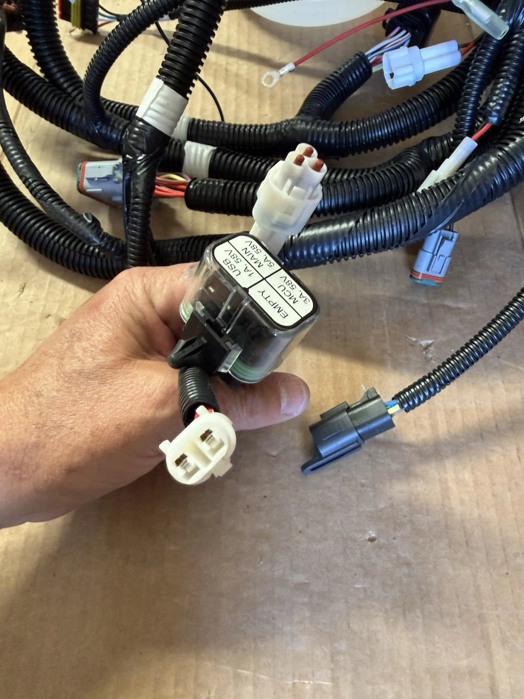 New Yamaha J5A-H2590-10-00 wire harness assembly for golf carts with corrugated protective sleeves, electrical connectors, and labeled relay module