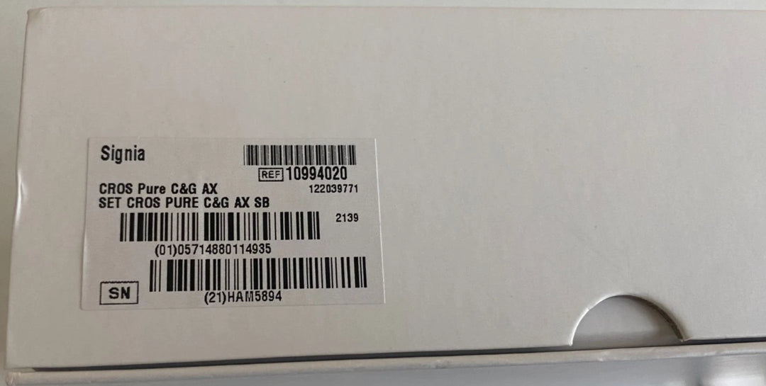 Product packaging with Signia branding and barcodes on a white background