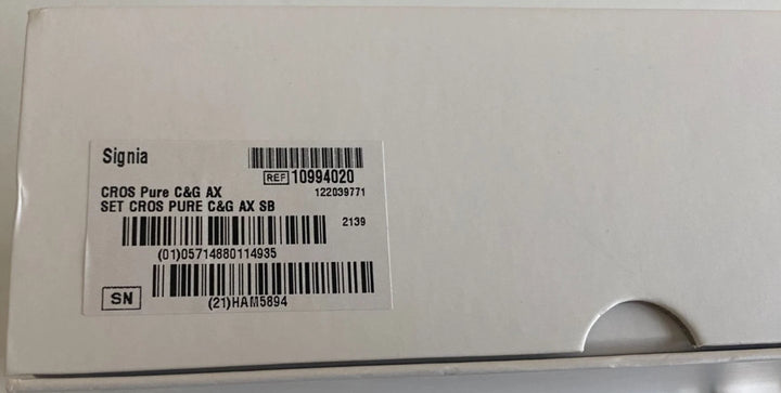 Product packaging with Signia branding and barcodes on a white background