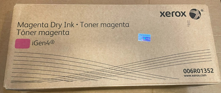 Rectangular cardboard box for a magenta dry ink toner cartridge with Xerox branding and PHENTERSALES vendor identification on a plain surface.