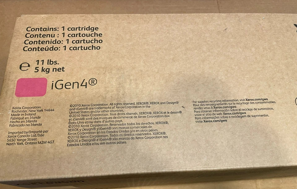 Brown cardboard box packaging for a magenta iGen4 toner cartridge by PHENTERSALES, featuring product details and multilingual text on the surface.