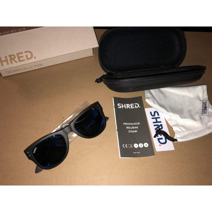 Shred Belushki black men's sunglasses with blue mirror polarized lenses, stylish design, and quality craftsmanship made in Italy.