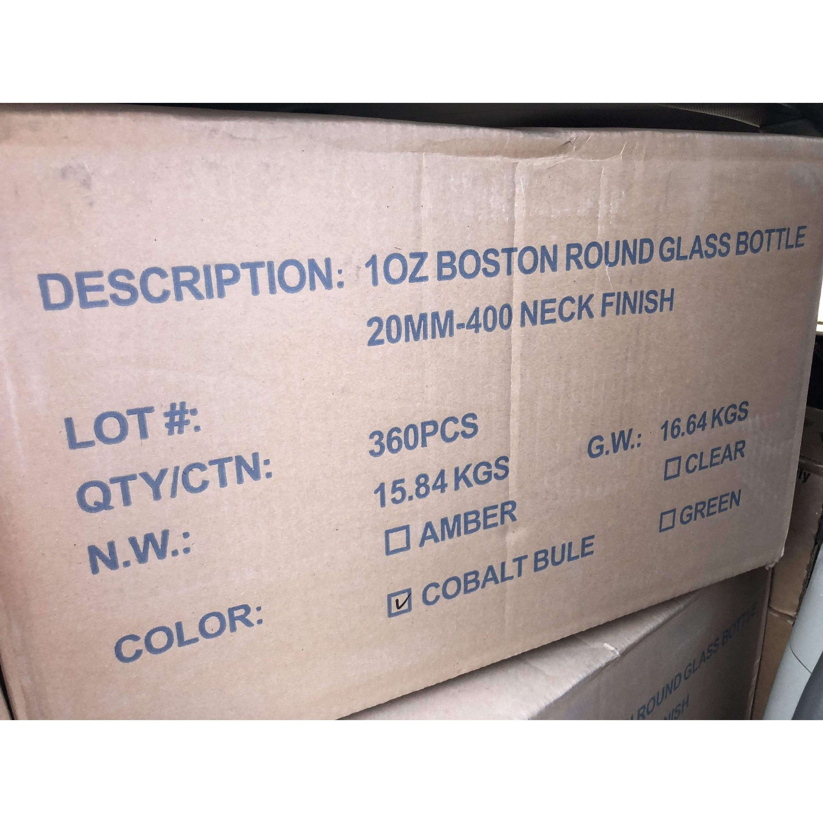 Cobalt blue glass Boston round bottle, 1 oz, (360 pcs/case), perfect for storing liquids, stylish and durable design, new condition.