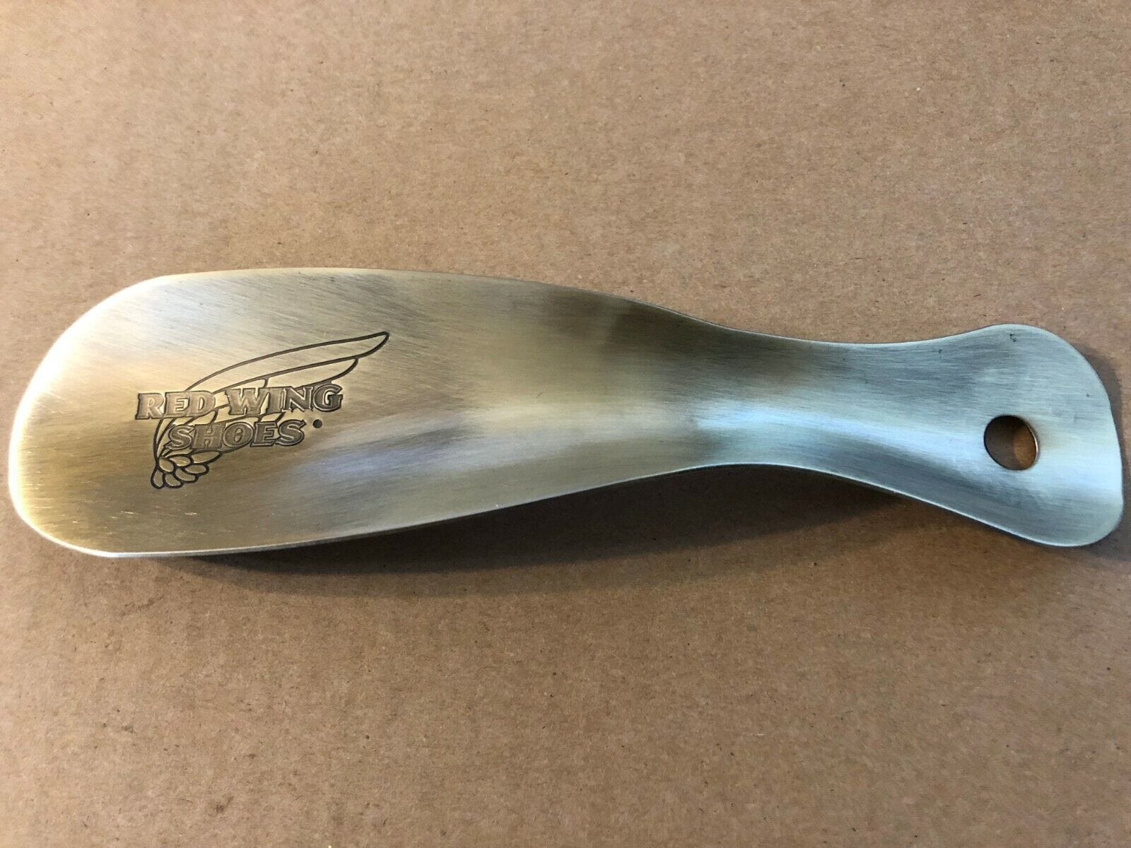 95189 Brass Shoe Horn, Made in USA, durable and sleek for easy shoe fitting.